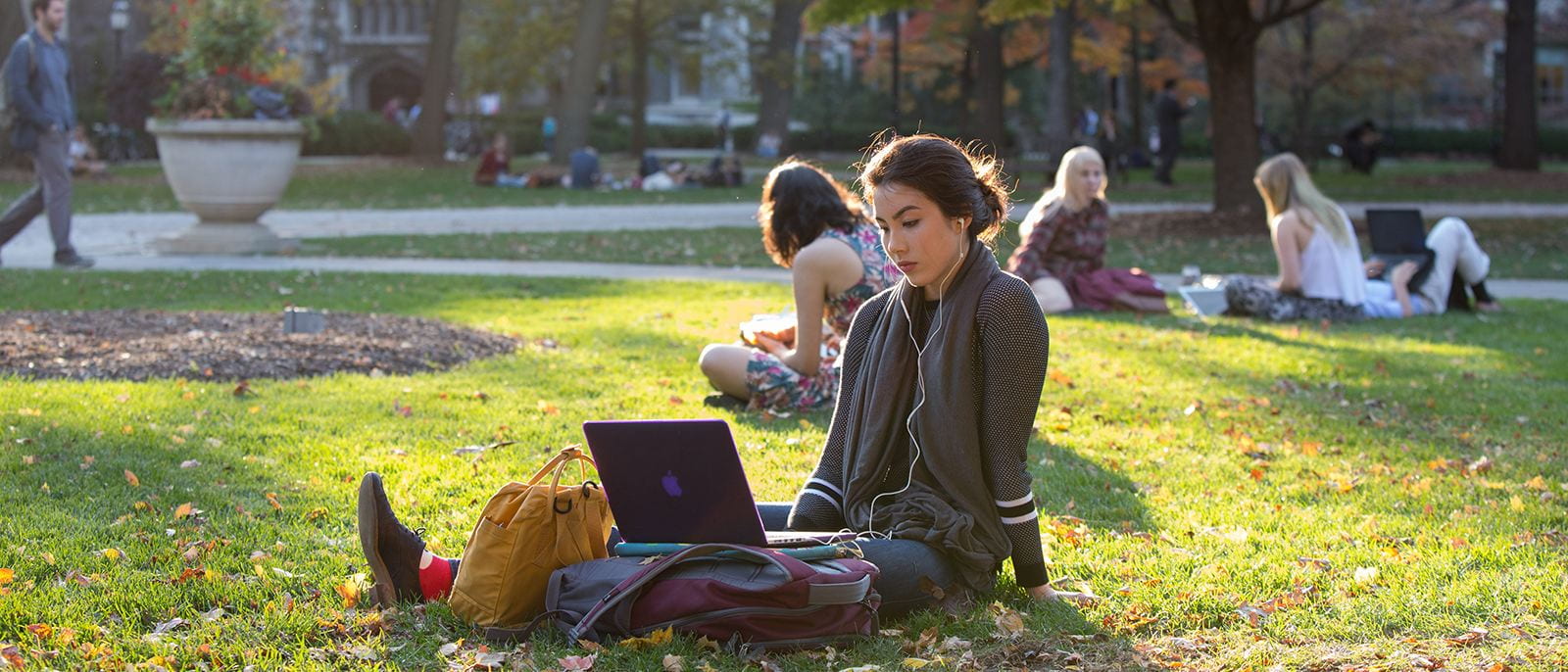 Girl in quad with laptop